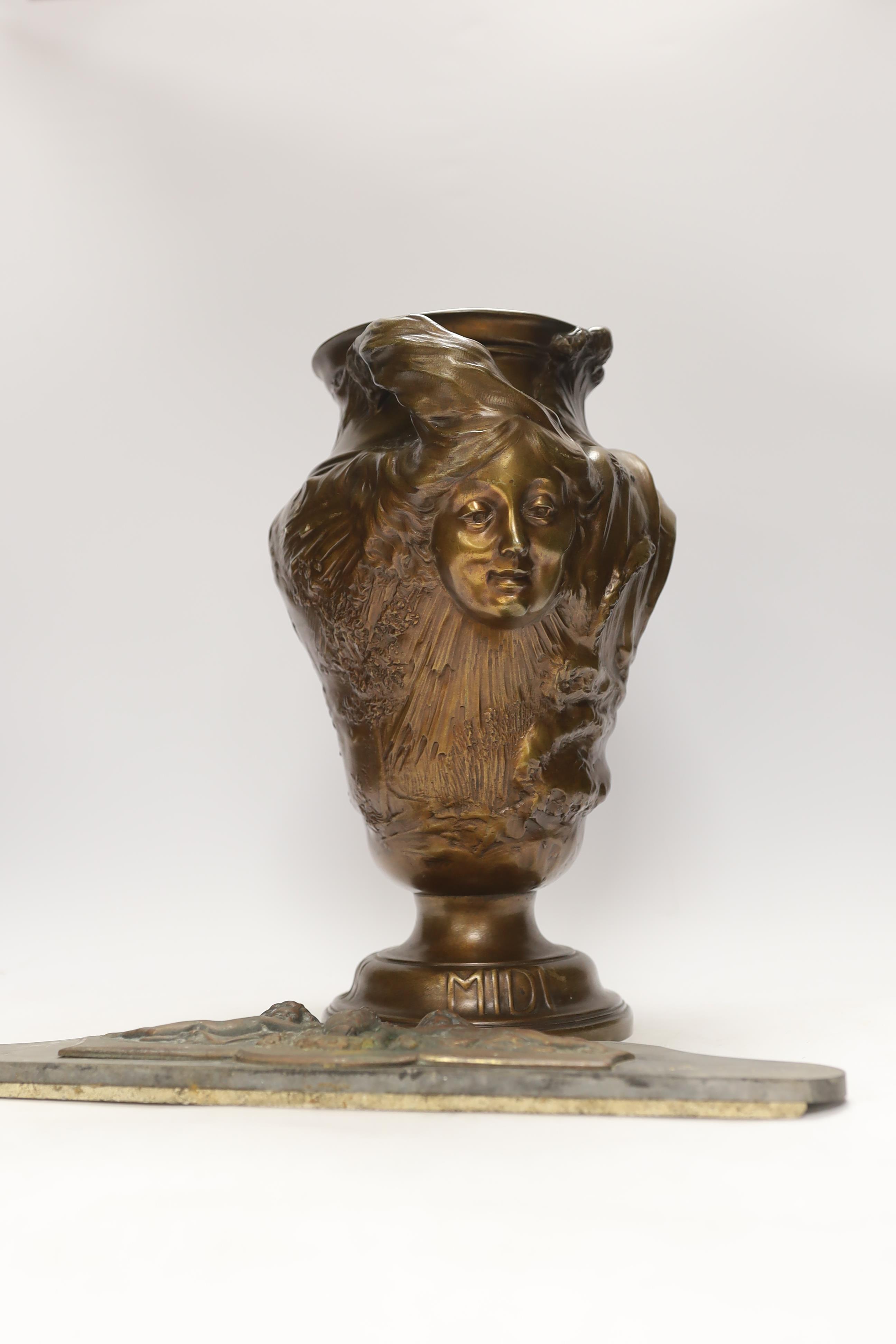 A Jules Prosper Legastelois bronze figural Art Nouveau vase and a slate pediment decorated with two putti, the vase signed, 34cm high